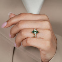 Marquise diamond ring with claw prong setting.