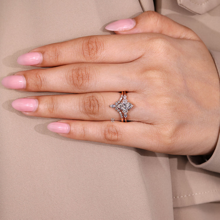 V shaped wedding band with marquise and round diamonds.