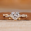 Heart cut diamond ring with twisted pave style.