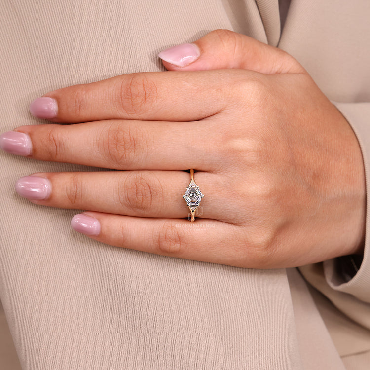 Hexagon step cut diamond ring IGI certified style.

