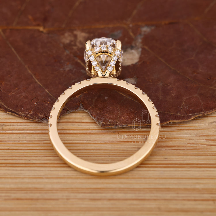 IGI certified oval diamond ring pave halo style.
