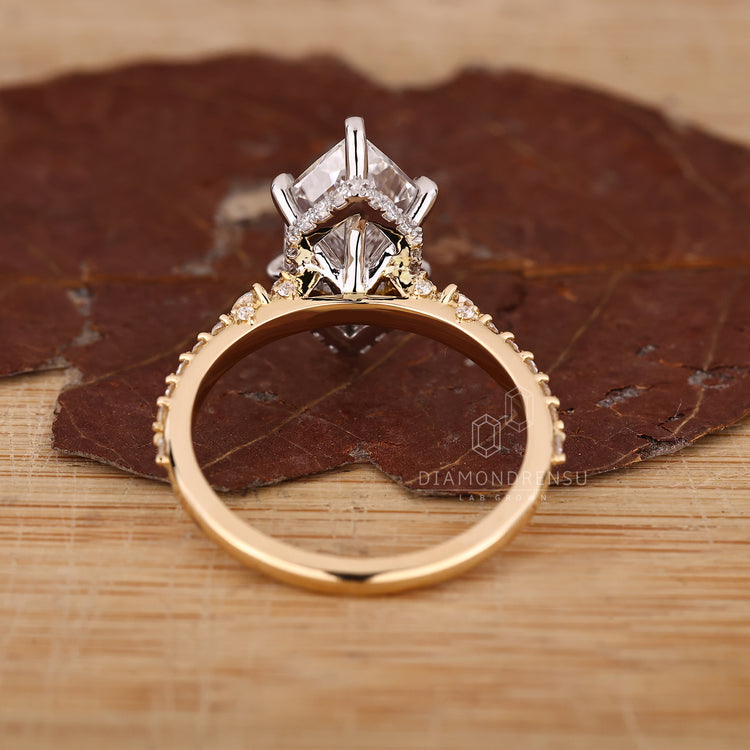 IGI certified marquise ring hidden halo six claw set.
