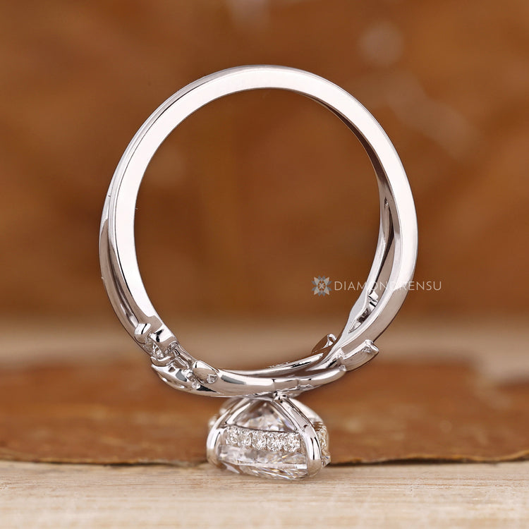 Handmade marquise diamond ring compass setting.