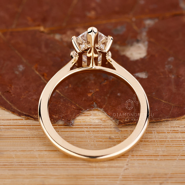 IGI certified marquise diamond ring v prong cathedral.
