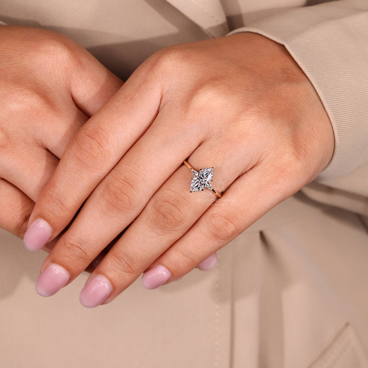 Marquise cut diamond ring IGI certified cathedral.
