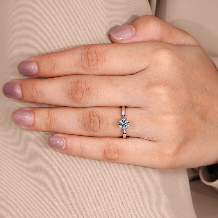Handmade round cut diamond ring pinched shank style.
