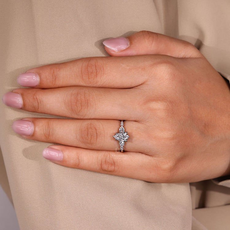 Handmade pear cut diamond ring seven stone style.

