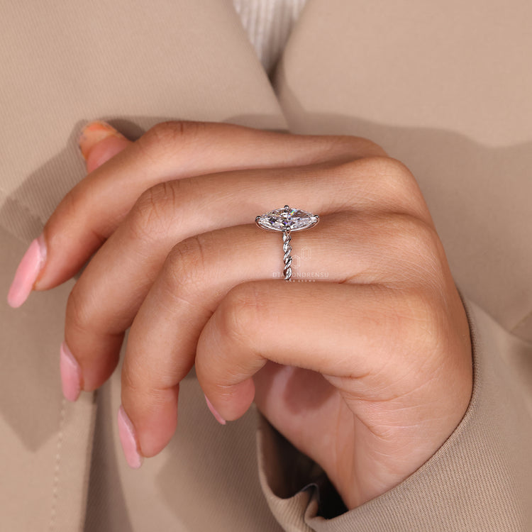 Handmade marquise diamond ring twisted pave design.
