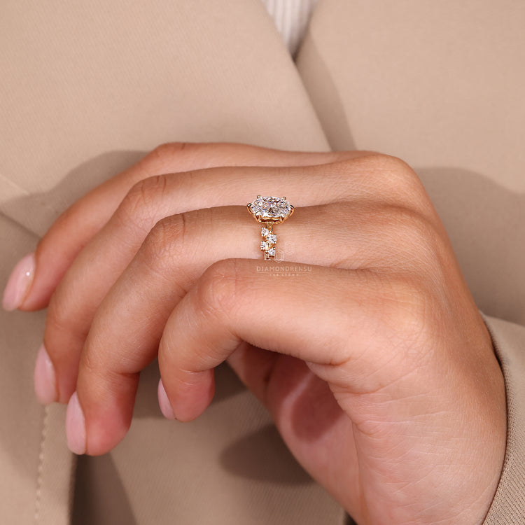 Oval cut ring cluster vintage six claw prong set.
