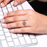 Lab grown Dutch marquise diamond ring with filigree detail.
