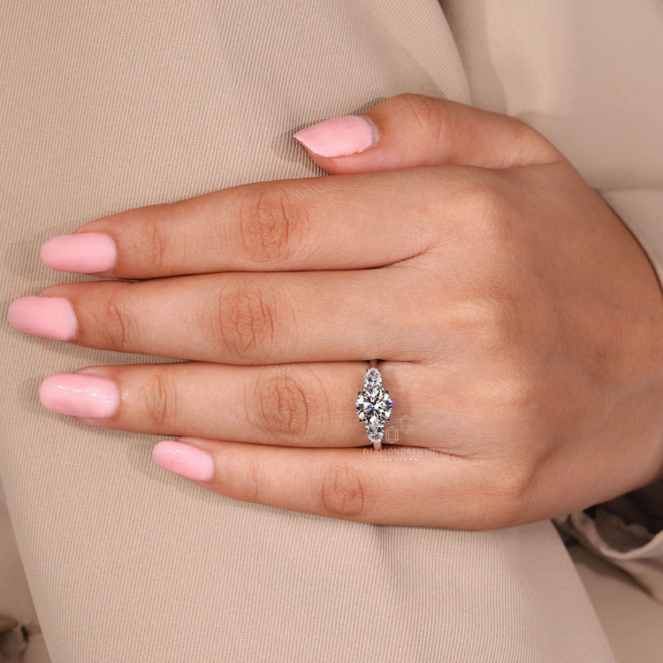 Handmade round cut diamond ring three stone style.
