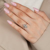 Nature inspired marquise ring with leaf prongs.
