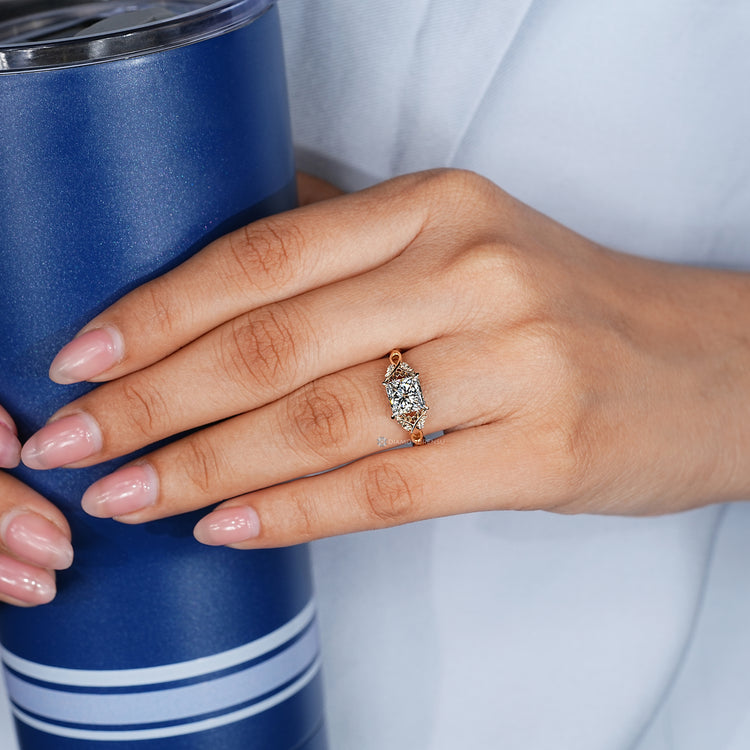 Princess cut diamond ring with tulip basket setting.