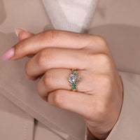 Coffin cut ring round emerald stones design.