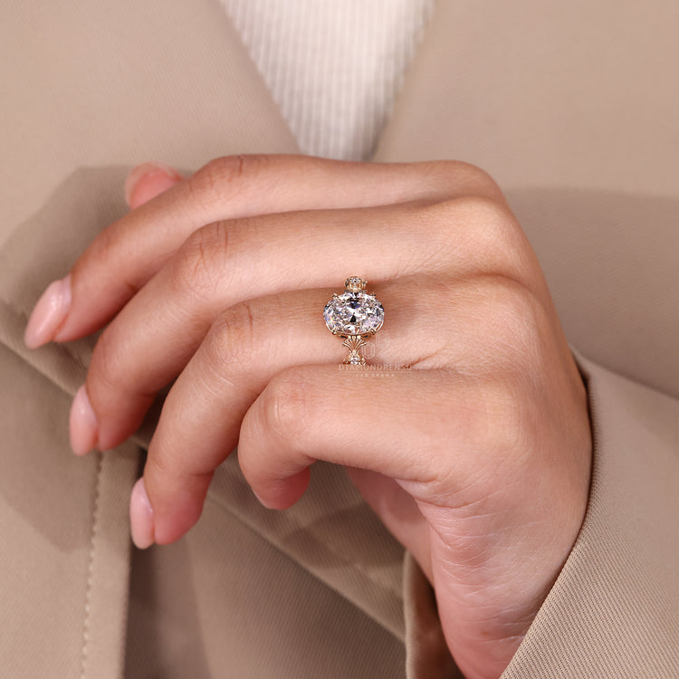 Vintage diamond ring with four leaf style prong.
