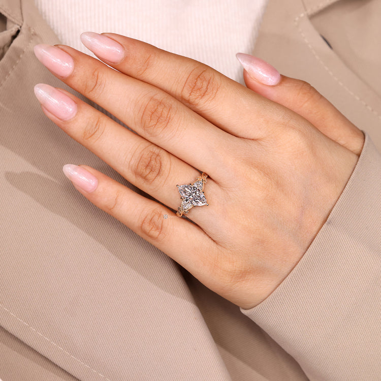 Lab grown marquise diamond ring leaf detailing.