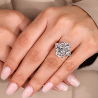 Handmade jewellery three stone diamond ring with cathedral setting.