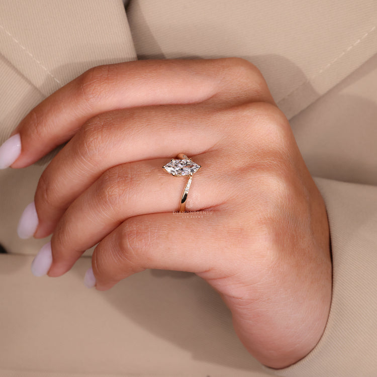 Round side stone added to yellow gold engagement ring.
