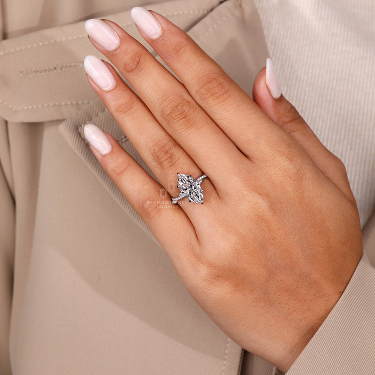 Custom Engagement Ring with marquise cut and pave setting.
