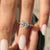 Unique engagement ring in yellow gold with fine pave and claw prong ring setting