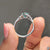 Cyan blue moissanite ring glows with bold and vivid colour.
