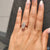 Muse setting ring highlights the centre stone with flair.
