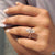 Prong setting holds each stone securely with clean lines.
