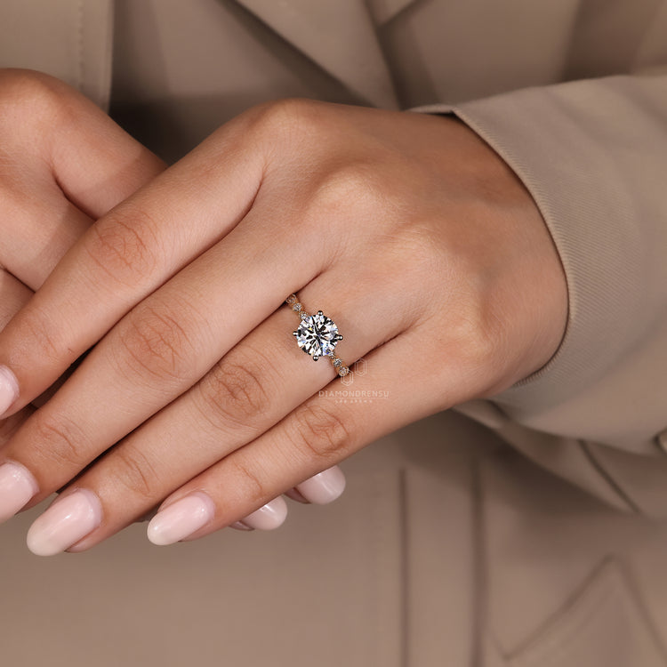 Unique round engagement ring with prong setting.
