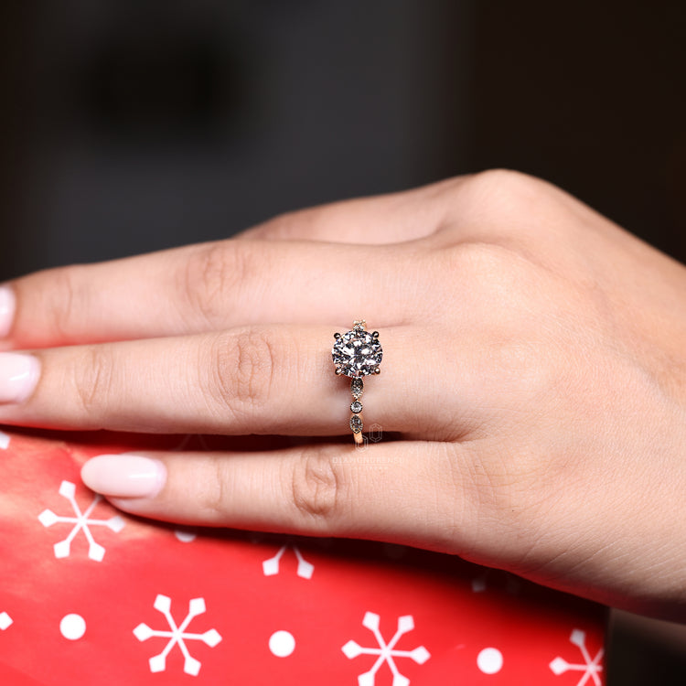 Marquise shape outline ring in yellow gold.
