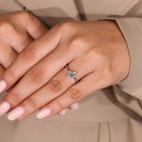 Princess cut engagement ring with white gold engagement ring.
