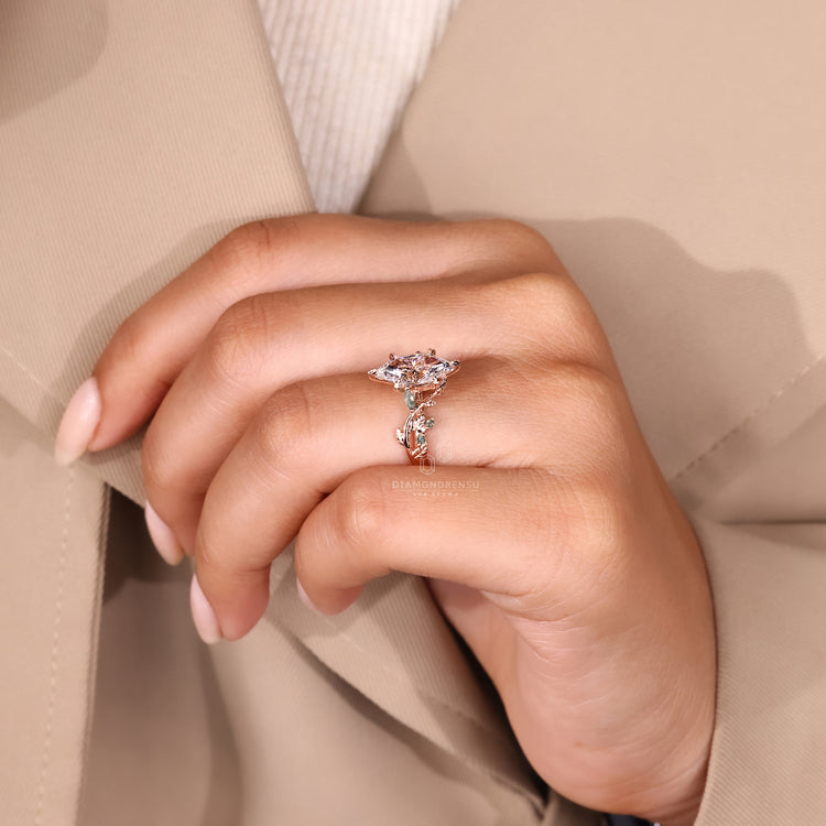 Nature inspired engagement ring with leaf style pave setting.
