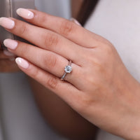 Gold solitaire ring with white gold diamond ring.

