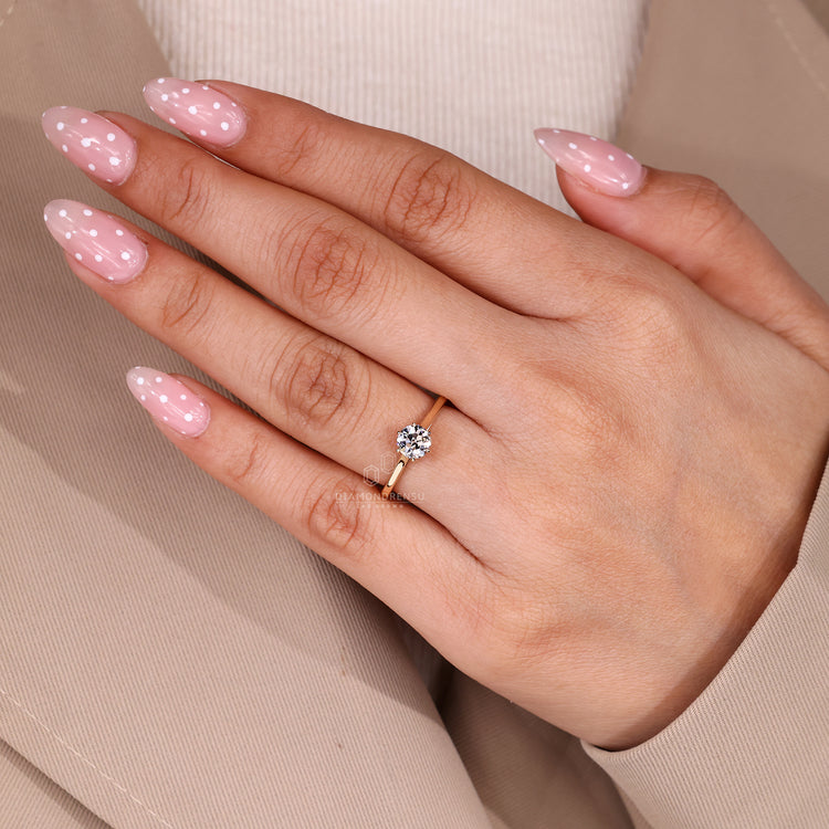 Lab Grown Round Old European Cut Ring claw prong.
