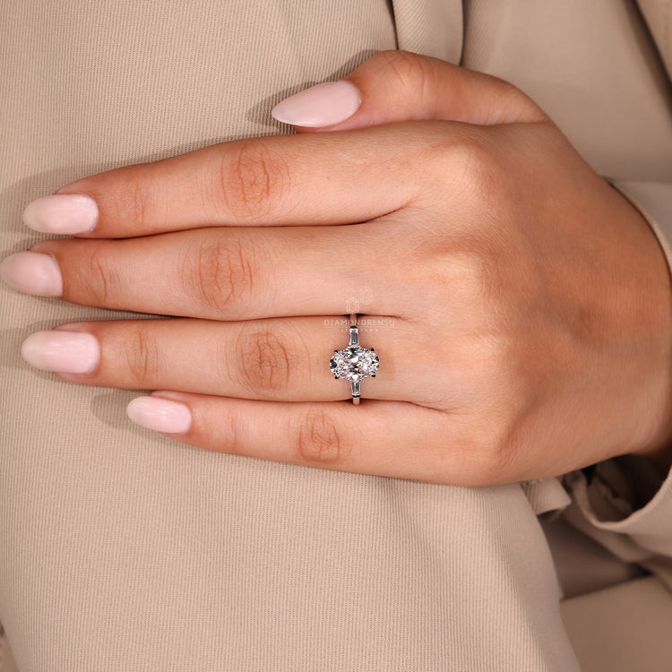 Bar setting ring with 3 stone diamond engagement ring.
