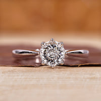 Portuguese cut engagement ring with cathedral setting ring.
