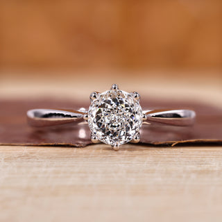 Portuguese cut engagement ring with cathedral setting ring.
