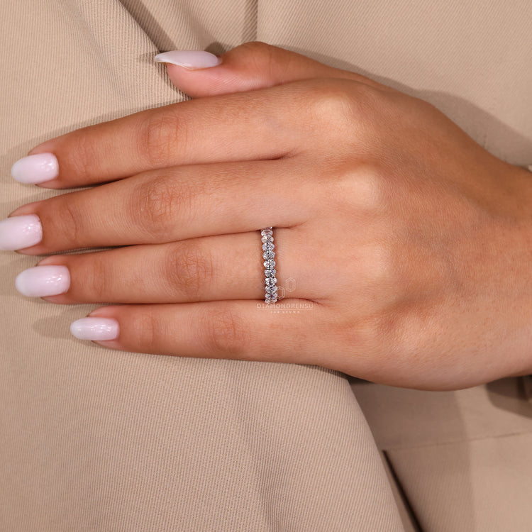 Custom oval diamond wedding band.