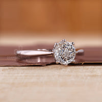 Cathedral setting ring suits Portuguese cut engagement ring.
