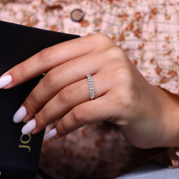 Half eternity wedding band with diamonds.