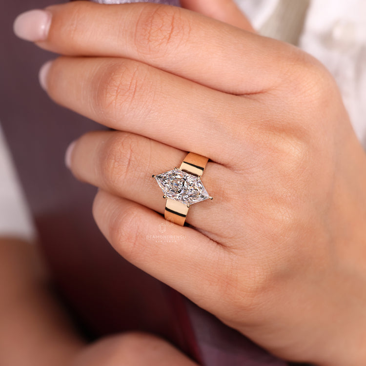 Tapered shank ring featuring solitaire lab grown diamond.