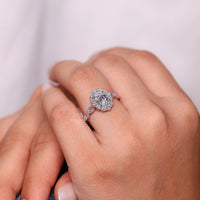 Round Cut Ring with 4 prong setting and white gold band.
