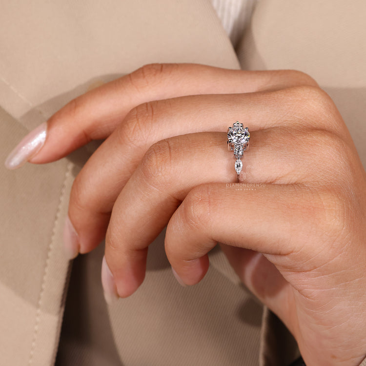 Lab Grown Diamond Ring featuring round and marquise cut.
