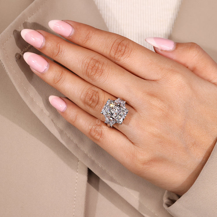 4 claw prong ring with radiant cut lab grown diamond.