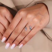 Aqua round diamond ring in open gap style.

