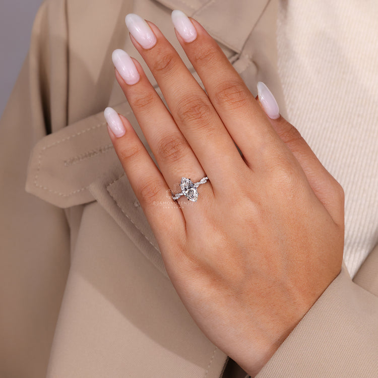 IGI certified engagement ring with round cut accents.
