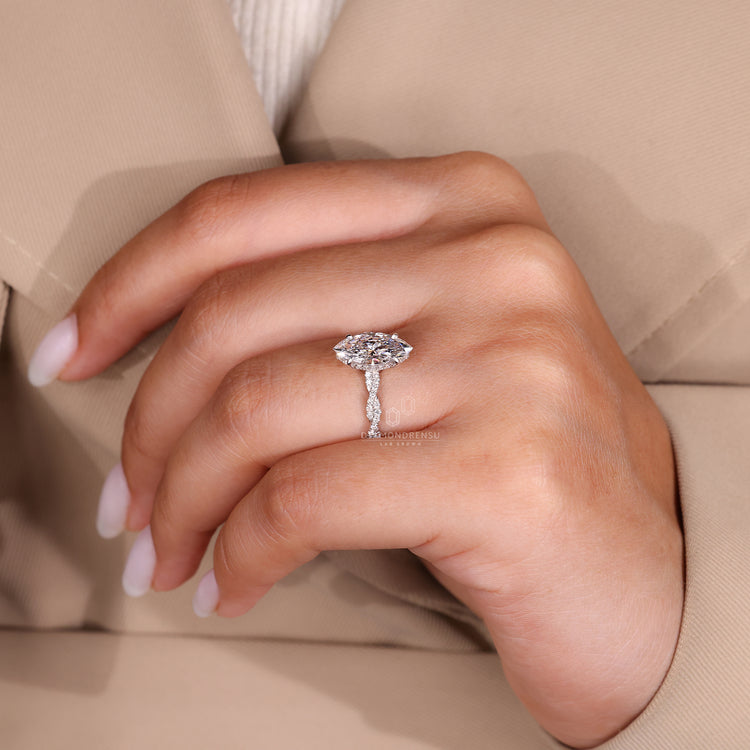 Buy marquise diamond engagement ring with hidden halo.
