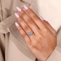 Designer cluster diamond engagement ring style.
