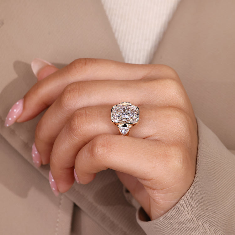 Lab Grown Cushion Cut Diamond Ring three stone design.
