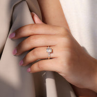 Art deco engagement ring with 4 claw prong setting.
