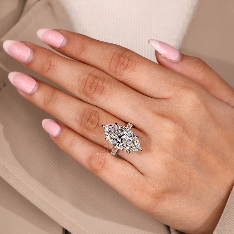 Diamondrensu AU ring with marquise diamond and hidden halo.